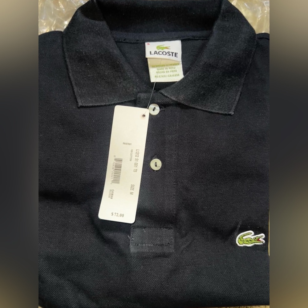 Lacoste polo shirt medium
New with tags never worn, black